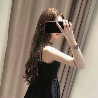 笑看伊人戴红妆